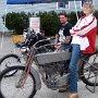 The Late Mona Parsons (she and her late husband, Fred, were founding members of the club) on her 1914 Harley Twin 2-speed, with her grandson, Nik, on a bobber.